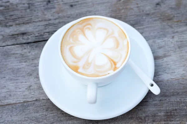 Kopje koffie op houten tafel — Stockfoto