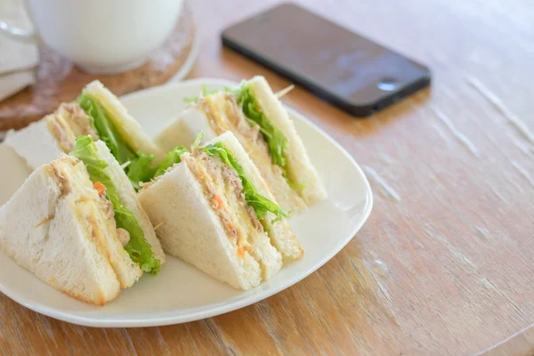 Fresh made tuna sandwiches on wood table — Stock Photo, Image