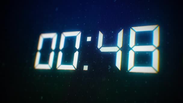 Close-up of 60 Seconds countdown White numbers on a Computer Screen in Defocus. 1 minute countdown. 30 or 10 seconds. White digits on a Black Background — Stock Video