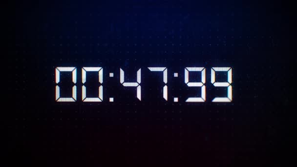 Close-up de 60 segundos contagem regressiva Números brancos em uma tela de computador em Defocus. Contagem regressiva de 1 minuto. 30 ou 10 segundos. Dígitos brancos em um fundo de tecnologia digital. Textura de pixels LCD da tela LED — Vídeo de Stock