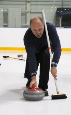 Rusya, Volgodonsk - 18 Ocak 2015: Curling. Club kıvırma fanlar. Club kıvırma hayranları curling