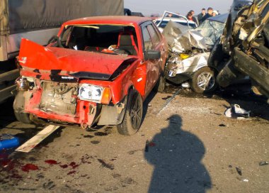 Kharkov, Ukraine - June 14, 2010: Consequences of a car accident, a wrecked car. Road traffic accident clipart