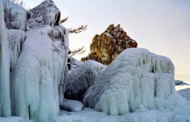 Winter on the Baikal, ice and snow on the lake. The beauty of the nature of Baikal in winter. clipart