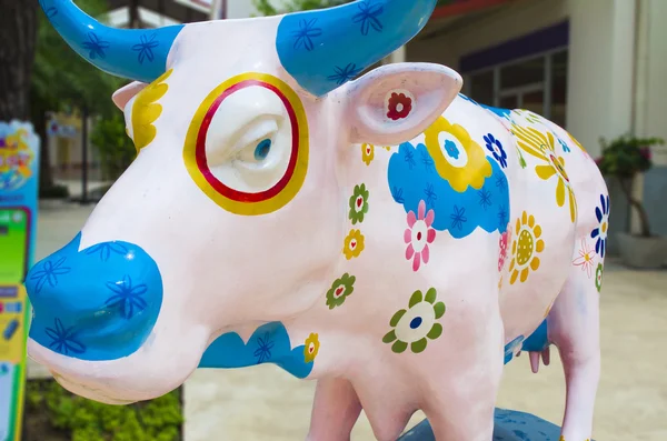 Artificial Cow with Colourful Painting Flowers — Stock Photo, Image