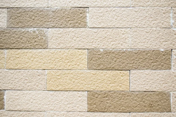 Deitado parede de tijolo colorido — Fotografia de Stock