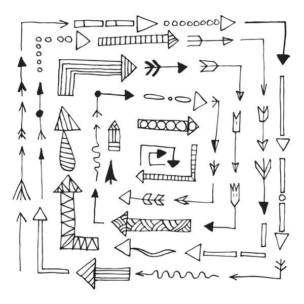 Набор стрелок, нарисованных вручную, на белом фоне — стоковый вектор