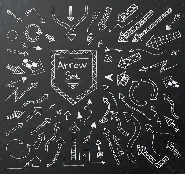 Hand drawn arrow icons set on black chalk board — Stock Vector
