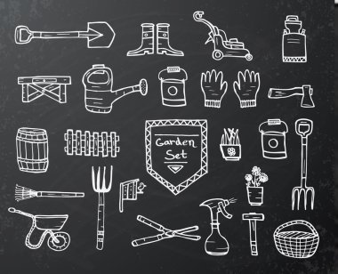 Collection of garden elements on black chalkboard 