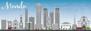 Gri binalar ve mavi gökyüzü ile Manila manzarası.