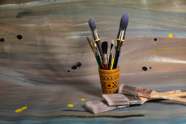 Brushes Painting Wooden Pencil Case Lying Old Canvas Painted Oil — Stock Photo, Image
