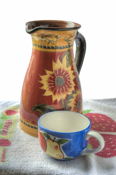 Clay jug and a cup — Stock Photo, Image