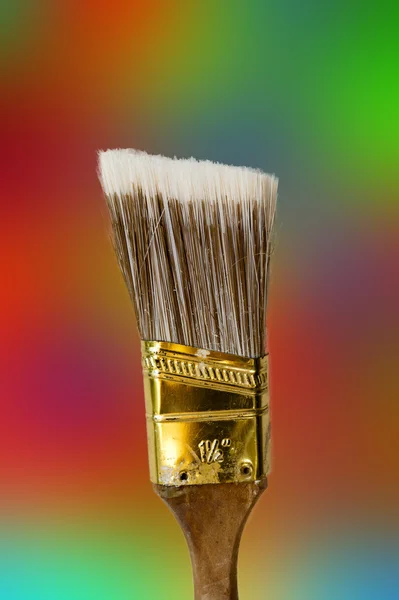 Brush against a colored background — Stock Photo, Image