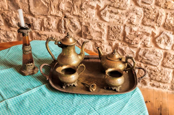 Bronze coffee service on the table — Stock Photo, Image