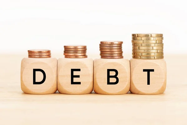 Debt Concept Wooden Blocks Text Coins Wooden Table Copy Space — Stock Photo, Image