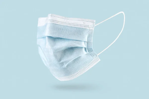 Medische Chirurgische Gezichtsmasker Geïsoleerd Blauwe Achtergrond Wegwerpmasker Coronavirus Covid Bescherming — Stockfoto