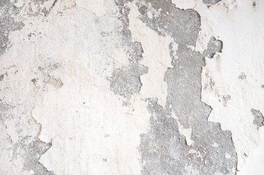 Eski Duvar patlamış alçı ve boya tıkanıklığı, boya hasarı, bina duvarında su hasarı. Grunge soyut arkaplanı