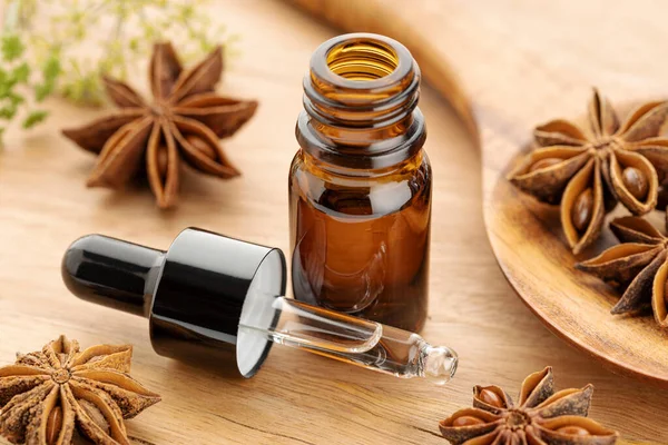 Star Anise Essential Oil Bottle Wooden Table Alternative Medicine — Zdjęcie stockowe