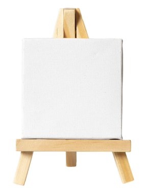 Tahta sehpadaki boş beyaz tuval beyaz arka planda izole edilmiş. şablon modellemesi