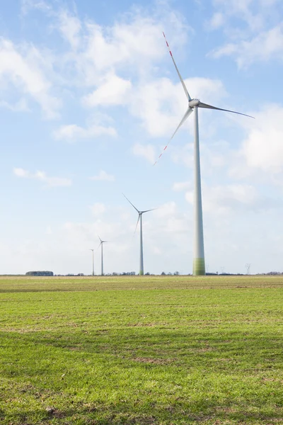 Windmill wind power plant - on the field — Stock Photo, Image
