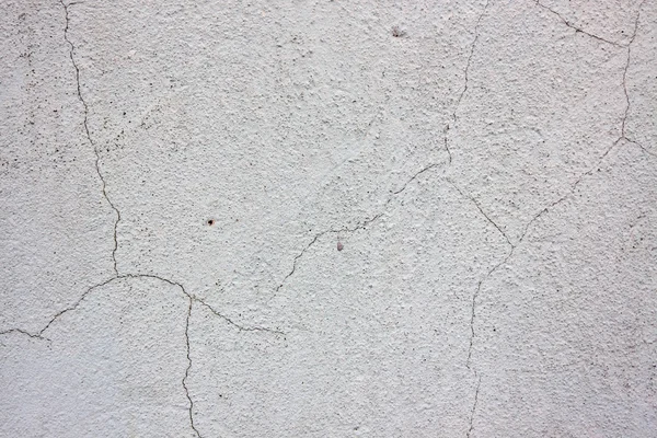 Cracked plaster as a background — Stock Photo, Image