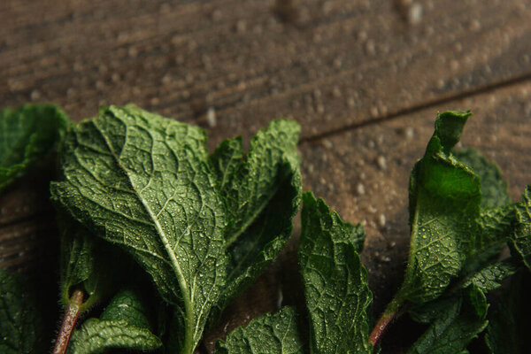 ripe lettuce leaves lie on the table close-up. greens from the garden.