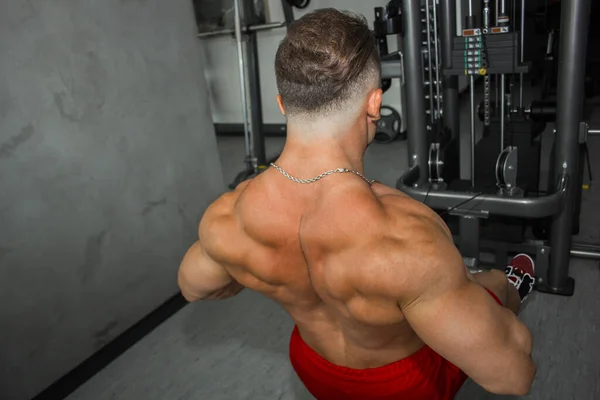 Man Big Muscles Engaged Weightlifting Gym Pumped Athlete Goes Sports — Stock Photo, Image