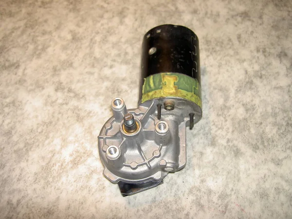 Electric wiper motor with aluminum gearbox, removed from the car, front side, image