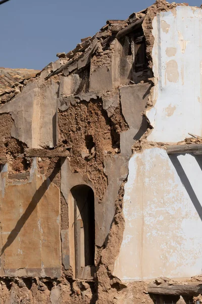 Remains of a house in ruins, with adobe walls, in the small town of Ambel, in the Campo de Borja region, Zaragoza, Aragon, Spain. Visible effect of depopulation and emptied Spain.