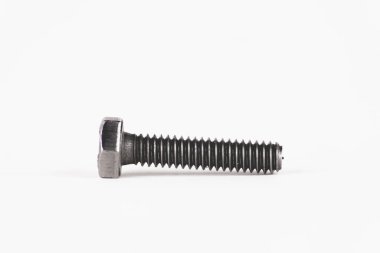 Gri metal bir vidanın fotoğrafı, dünyanın herhangi bir yerindeki hırdavatçılarda yaygın bir parça, beyaz bir arka planda izole edilmiş herhangi bir ev veya mekanik yapıyı onarmak için kullanılır. Metalik bir yatağın fotoğrafı, herhangi bir yerdeki hırdavatçılarda bulunan ortak bir parça.