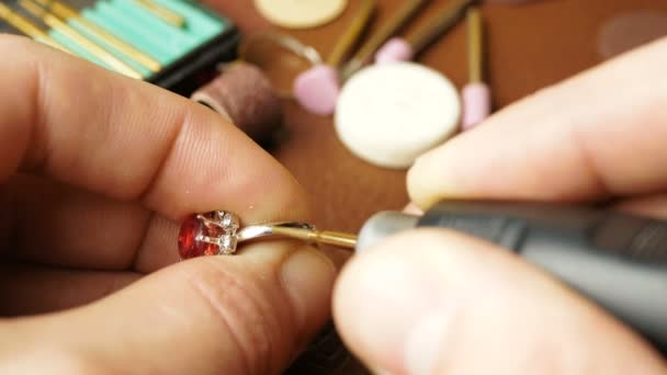 Jeweler Cutting Precious Stone Gold Ring Professional Jeweler Polishes Red — Stock Video