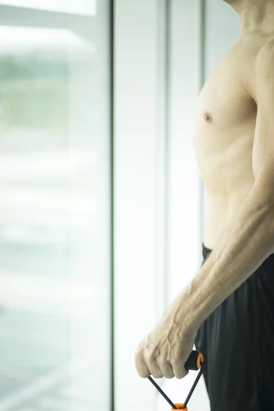 Man exercising nude torso — Stock Photo, Image