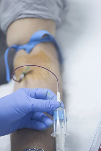 Nurse and male patient blood sample donation — Stock Photo, Image