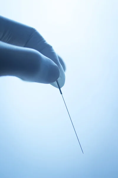 Doctor hand acupuncture needle dry needling — 스톡 사진