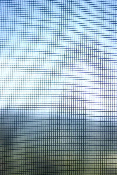 Fly net moskitiery w oknie — Zdjęcie stockowe