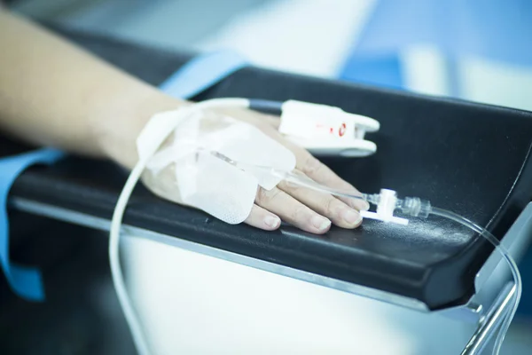 Patient hand in hospital operating room surgery — Stock Photo, Image