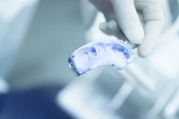 Molde dental dentistas dientes de arcilla gel placa de goma fundida — Foto de Stock