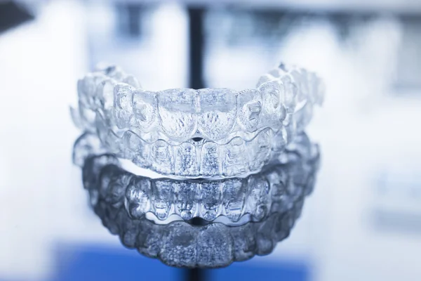 Invisible dental teeth brackets aligners braces retainers — Stock Photo, Image