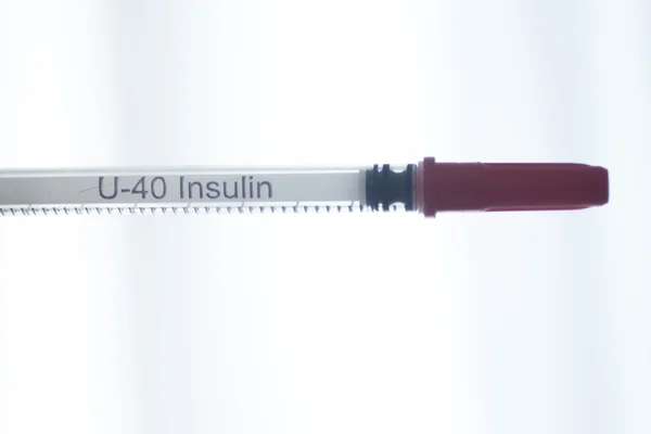 Phials of insulin medication U-40 syringe — Stock Photo, Image