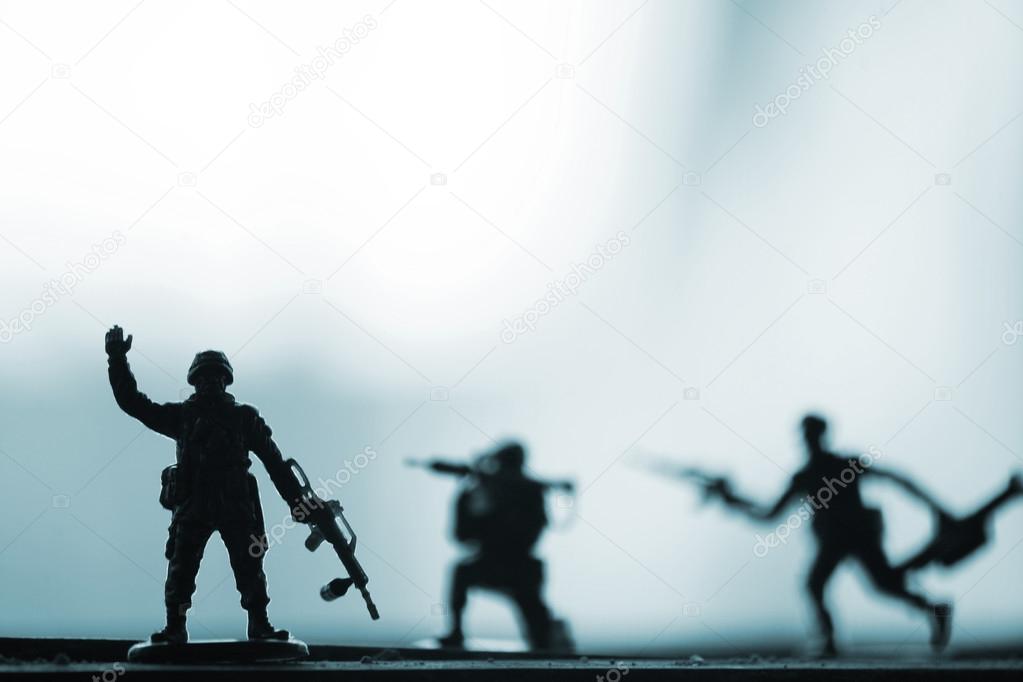 Toy military soldiers and guns