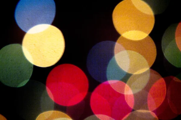 Colored defocused party lights — Stock Photo, Image