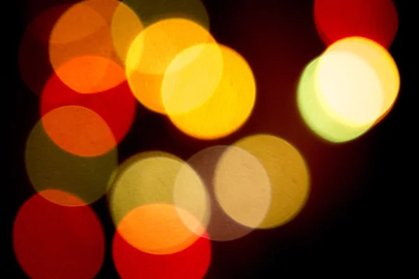 Luces de fiesta desenfocadas de colores — Foto de Stock