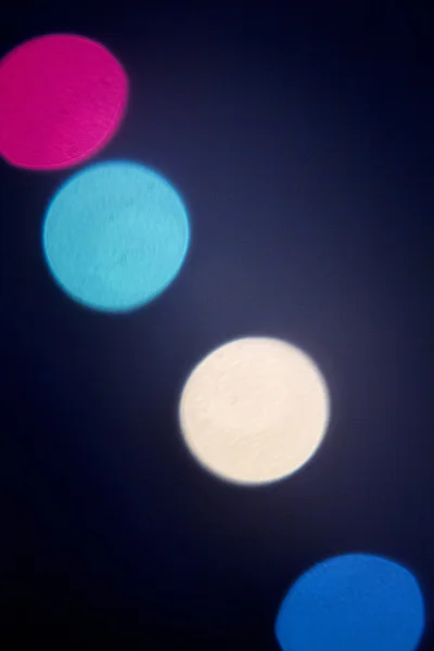 Luces de fiesta desenfocadas de colores — Foto de Stock