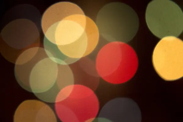 Luces de fiesta desenfocadas de colores — Foto de Stock