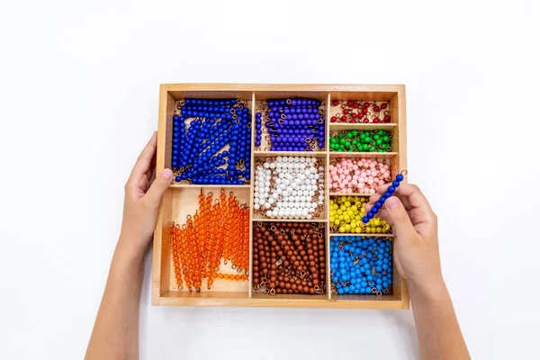 Top View Girls Hand Playing Sorting Puzzle Colored Plastic Beads — Stock Photo, Image