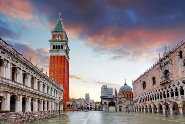 Piazza San Marco at dawn on a cloudy morning.