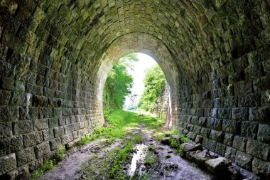 Long underground brick tunnel clipart
