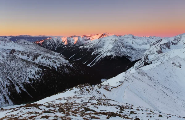 Panorama de inverno Montanhas Tatra ao nascer do sol — Fotografia de Stock