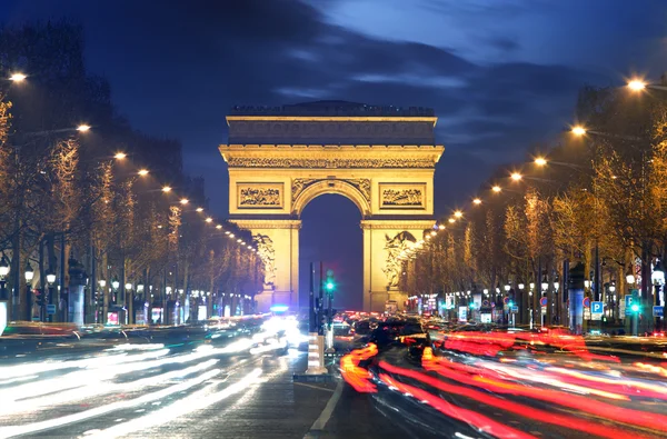 Triumfbågen paris stad vid solnedgången — Stockfoto