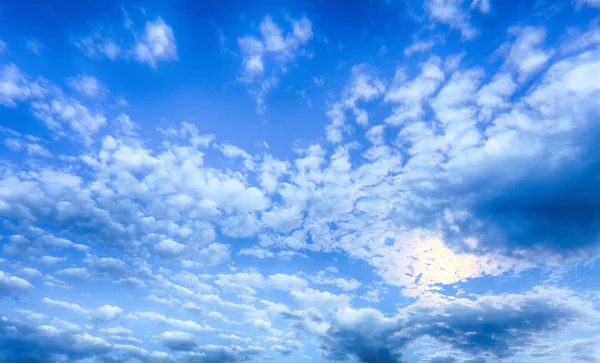 Blue sky at night with moon and clouds — Stok fotoğraf