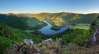 Beautiful Slovakian panoramic landscape with a rock and river do clipart